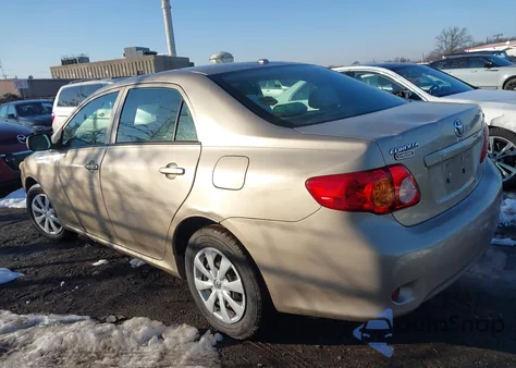 2009 Toyota Corolla Le из США, поврежденный, VIN 2T1BU40E99C050981